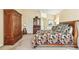 Spacious main bedroom featuring high ceilings, a ceiling fan, and carpet flooring at 2598 Ekana Dr, Oviedo, FL 32765