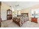 The main bedroom boasts high ceilings, a ceiling fan, and a walk-in shower at 2598 Ekana Dr, Oviedo, FL 32765