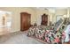 Spacious main bedroom featuring high ceilings, carpet flooring, and neutral paint at 2598 Ekana Dr, Oviedo, FL 32765