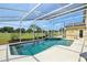 Sparkling pool and jacuzzi are enclosed with beautiful screen, perfect for outdoor enjoyment and privacy at 2598 Ekana Dr, Oviedo, FL 32765