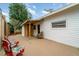 Charming outdoor patio featuring comfortable seating, a well-maintained surface, and a covered area at 2825 Mayer St, Orlando, FL 32806