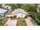 Charming single-story home with a well-maintained front yard, cozy carport, and paved basketball area at 2825 Mayer St, Orlando, FL 32806