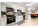 Kitchen with stainless steel appliances, and granite countertops at 2825 Mayer St, Orlando, FL 32806