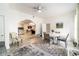 Bright living room with tile floors, white walls, ceiling fan and sliding doors to bring the outside in at 2825 Mayer St, Orlando, FL 32806