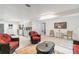 Inviting living area offering ample seating and an open view to the kitchen at 2825 Mayer St, Orlando, FL 32806