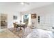 Bright living room with tile floors, white walls, ceiling fan and sliding doors to bring the outside in at 2825 Mayer St, Orlando, FL 32806