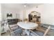 An open-concept room including kitchen, dining room, and living room, perfect for entertaining at 2825 Mayer St, Orlando, FL 32806