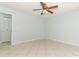 Neutral bedroom featuring tile flooring, ceiling fan, and lots of light at 2828 Whispering Way, Winter Park, FL 32792
