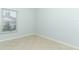 Empty bedroom with tile floors, window, and baseboard trim at 2828 Whispering Way, Winter Park, FL 32792