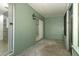 Outdoor screened in patio with green walls at 2828 Whispering Way, Winter Park, FL 32792