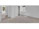 Bedroom with carpet, closet, and ensuite access for added privacy and comfort at 2908 Lingo Ln, Orlando, FL 32822