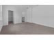 Spacious bedroom with carpet, connected to ensuite bathroom and walk-in closet for added convenience and privacy at 2908 Lingo Ln, Orlando, FL 32822