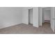 Bedroom with carpet, a closet, and ensuite access for convenience at 2908 Lingo Ln, Orlando, FL 32822