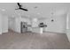 Open-concept kitchen features stainless steel appliances and a large island at 2908 Lingo Ln, Orlando, FL 32822