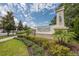 Elegant community entrance sign with lush landscaping and a welcoming atmosphere at 2938 Bushmead Ct, Ocoee, FL 34761