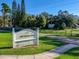 Lake Monroe Park entrance sign showing park information with blue skies and lush green grass at 305 Platform Ln, Debary, FL 32713