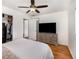 Cozy bedroom with ceiling fan, closet space, and dresser for ample storage at 3416 Grant Blvd, Orlando, FL 32804