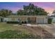 Charming single-story home with a manicured lawn and a driveway at 3416 Grant Blvd, Orlando, FL 32804