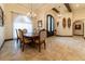 Dining room with chandelier and coffered ceiling, providing generous space for entertaining guests at 3437 Coronet Ave, Orlando, FL 32833