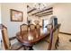 Formal dining room featuring a chandelier, coffered ceilings, with decorative accents for Gathering gatherings at 3437 Coronet Ave, Orlando, FL 32833