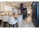 This kitchen features granite counters, stainless appliances, and an eat-in breakfast bar at 3437 Coronet Ave, Orlando, FL 32833