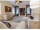 Inviting living room with fireplace, comfortable seating, and stylish decor for a cozy gathering space at 3437 Coronet Ave, Orlando, FL 32833