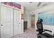 The bedroom has ample closet space and neutral carpet at 423 Pine Tree Blvd, Lake Alfred, FL 33850