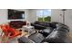 Spacious living room features a large sectional couch, accent chairs, and a plush rug at 423 Pine Tree Blvd, Lake Alfred, FL 33850
