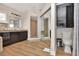 Bathroom featuring dual sink vanity with granite counters and walk-in shower at 434 S Beach St, Ormond Beach, FL 32174