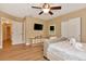 Bedroom with a large bed and closet with sliding doors at 434 S Beach St, Ormond Beach, FL 32174