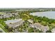 Aerial of a lakeside residential area featuring manicured grounds at 4474 Enders St, Orlando, FL 32814