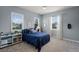 Comfortable bedroom with carpet, natural light, and a ceiling fan at 4474 Enders St, Orlando, FL 32814