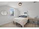Inviting bedroom featuring white walls and decor, carpet, and a desk space at 4474 Enders St, Orlando, FL 32814