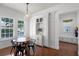 Dining room with a wood table, chairs, cabinet, and windows at 4474 Enders St, Orlando, FL 32814