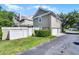 Home exterior shows a well-maintained yard, privacy fence, and garage access at 4474 Enders St, Orlando, FL 32814