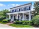 Beautiful two-story house boasting a large front porch with columns and well-maintained landscaping at 4474 Enders St, Orlando, FL 32814