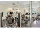 Well-equipped fitness center with modern machines and mirrored walls for a complete workout experience at 4474 Enders St, Orlando, FL 32814