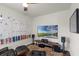 Cozy living room features modern entertainment setup and unique art at 4474 Enders St, Orlando, FL 32814