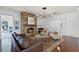 Inviting living area features a stone fireplace and comfortable seating arrangement at 4474 Enders St, Orlando, FL 32814