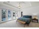 Main bedroom features doors leading to the pool area at 4474 Enders St, Orlando, FL 32814