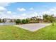 Well-maintained sand volleyball court next to a lake and grassy area, perfect for outdoor recreation at 4474 Enders St, Orlando, FL 32814