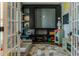 Charming playroom with built-in shelves, and a comfortable couch, ideal for activities at 459 Millwood Pl, Winter Garden, FL 34787
