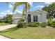 Lovely single-Gathering home with green lawn and beautiful landscaping at 491 Freeman St, Longwood, FL 32750