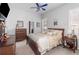 Comfortable main bedroom with ceiling fan, and dresser at 491 Freeman St, Longwood, FL 32750