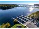 Beautiful aerial view of a lake with multiple docks, showcasing scenic waterfront access and recreational facilities at 550 Orient Ave, Debary, FL 32713