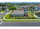 Aerial view of a home with a well-maintained yard and screened-in patio in a residential neighborhood at 570 Cascading Creek Ln, Winter Garden, FL 34787