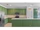 Spacious kitchen with an island, stainless steel appliances, granite countertops and open design at 570 Cascading Creek Ln, Winter Garden, FL 34787