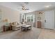 Cozy living room with neutral tones, a comfortable couch, and natural light at 570 Cascading Creek Ln, Winter Garden, FL 34787