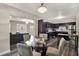 Open floorplan showcases the dining area, kitchen, and living space with natural light at 600 Bostwick Ave, Daytona Beach, FL 32118