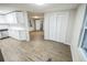 Open-concept kitchen with stainless steel appliances and dining area at 6354 Hill Rd, Orlando, FL 32810